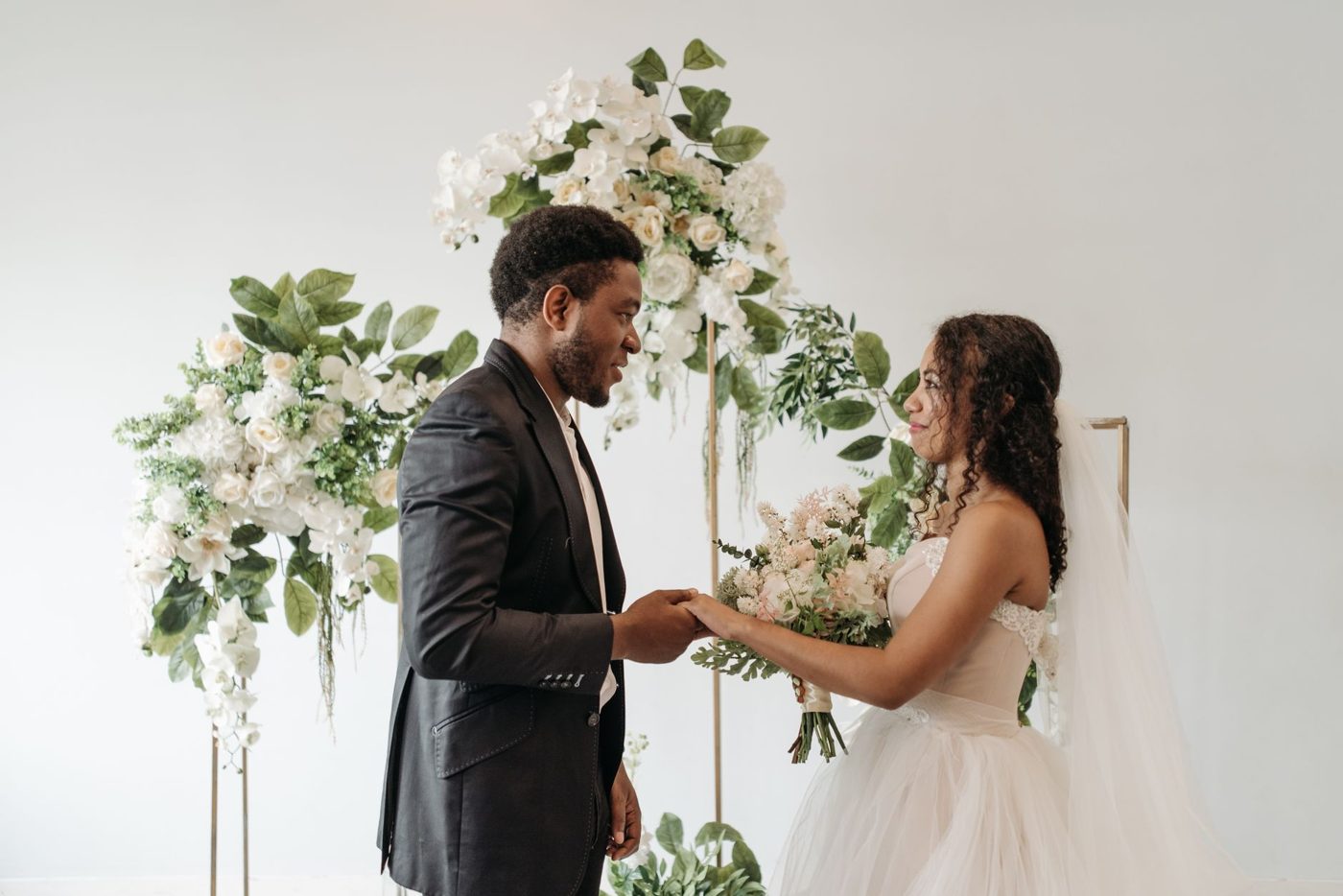 Groom reading his wedding vows to his bride during the ceremony